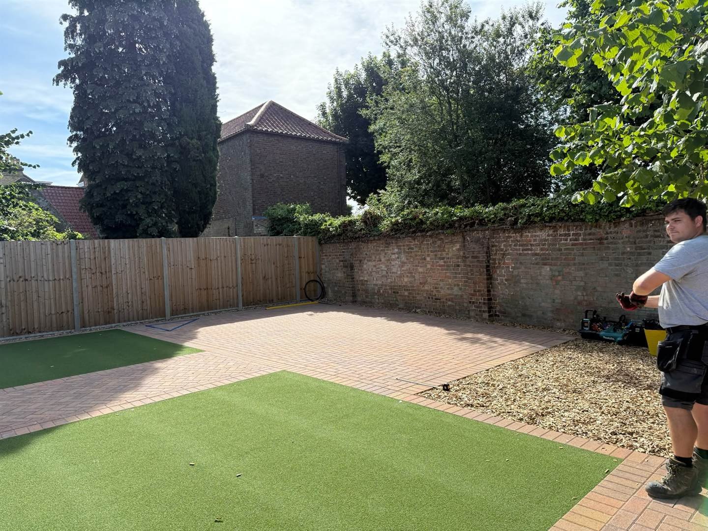 The prepared block-paved base before the garden room build began